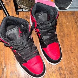 Air Jordan 1 Mids for sale. Black and Red.